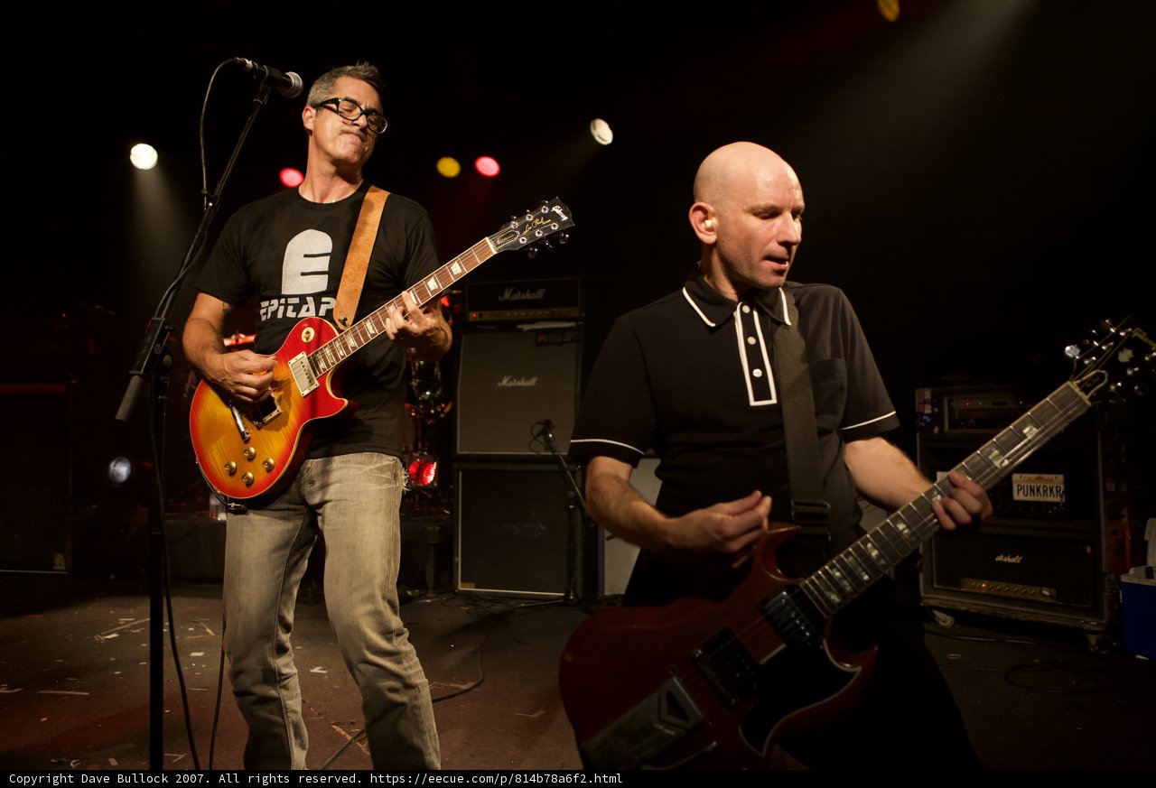 Two Guitarists Rocking the Stage at Bad Religion Concert