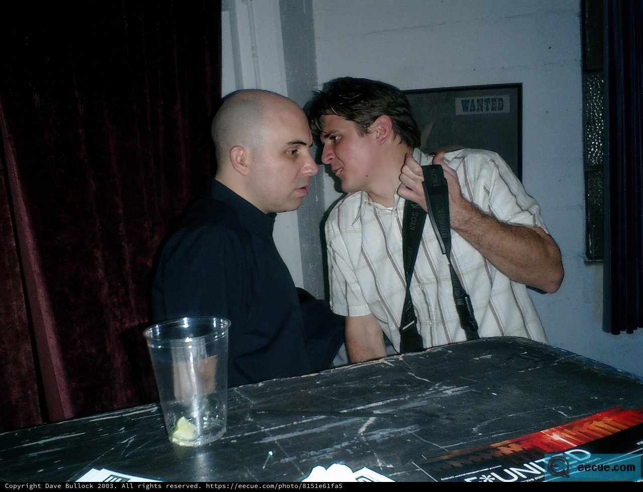 Two Men Enjoying a Drink at the Pub