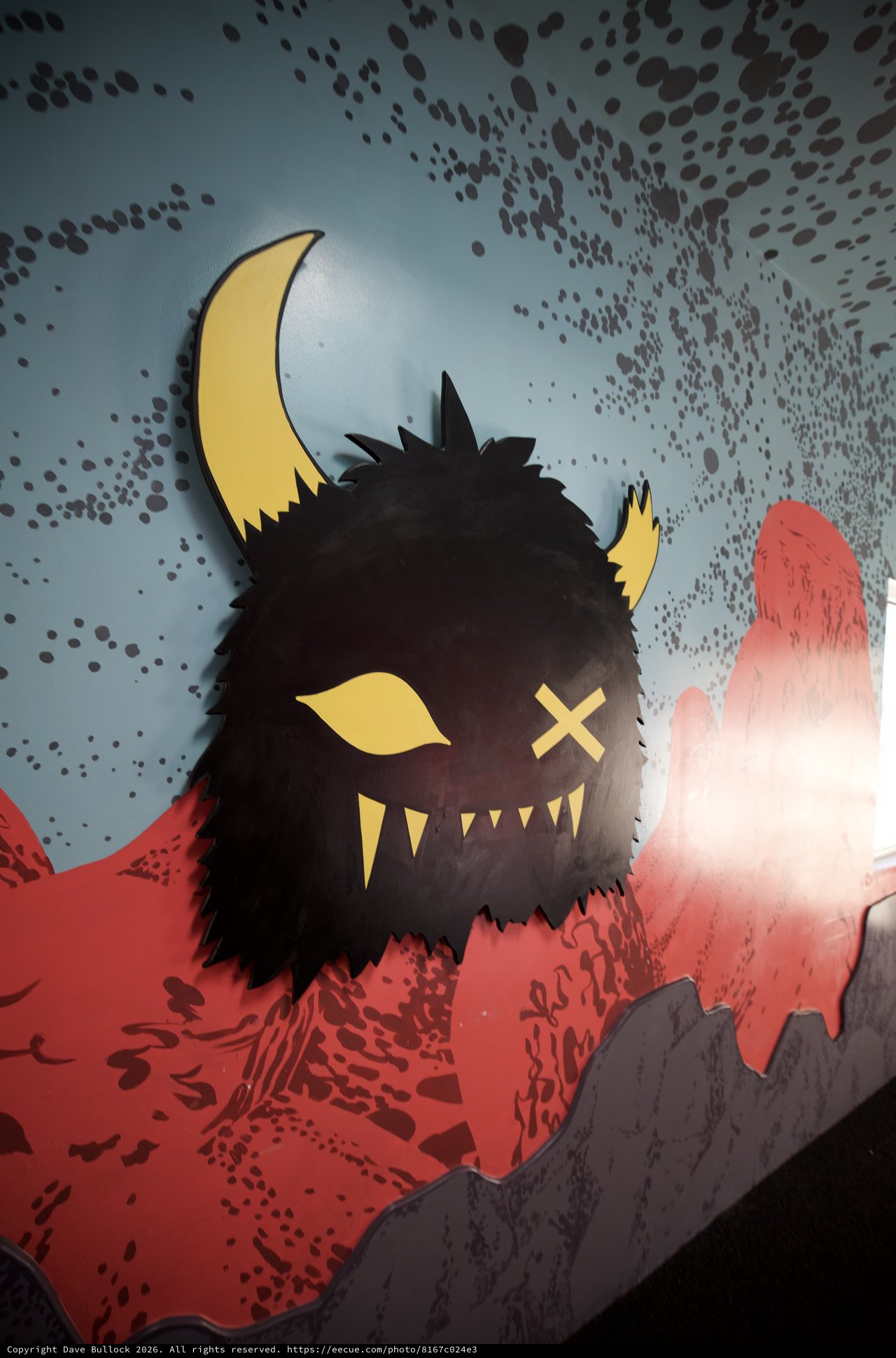 Mischievous Monster Mural with Crescent Moon in Santa Fe