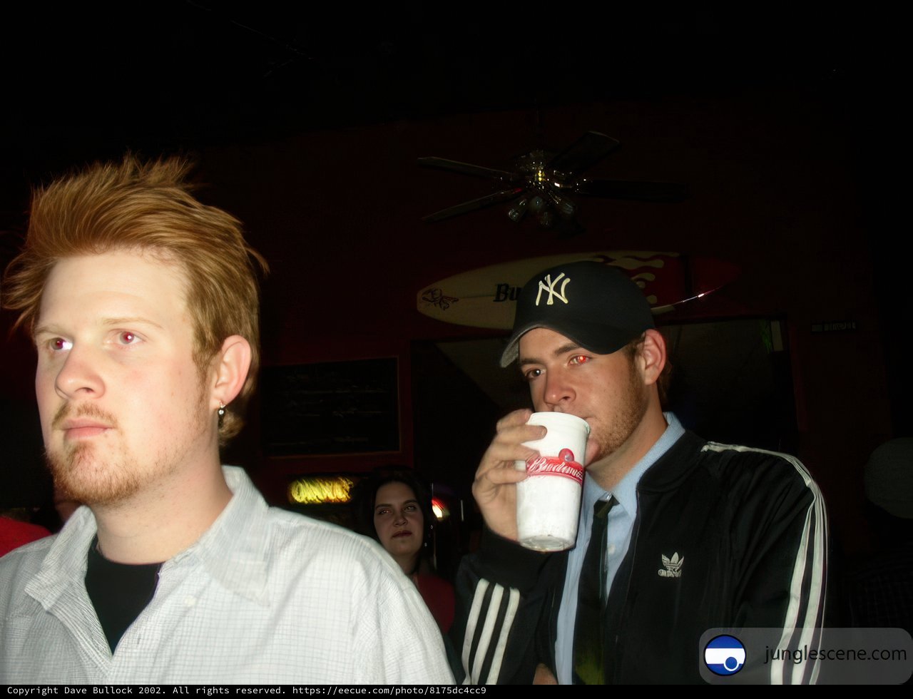 Two Friends Catching Up Over Drinks
