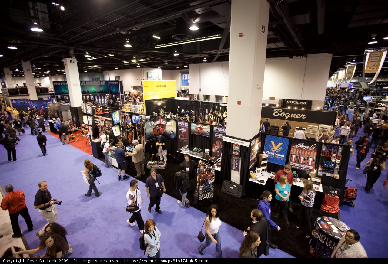 A Bustling Convention Featuring 11 Handbags, 2 Backpacks and 21 Shoes