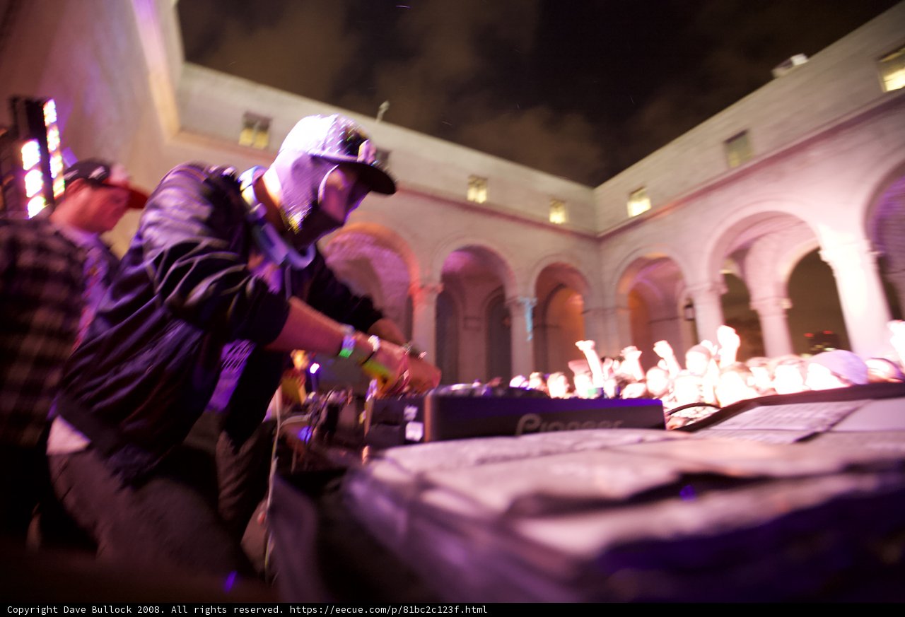 Outdoor Deejay Performance under Dazzling Lights