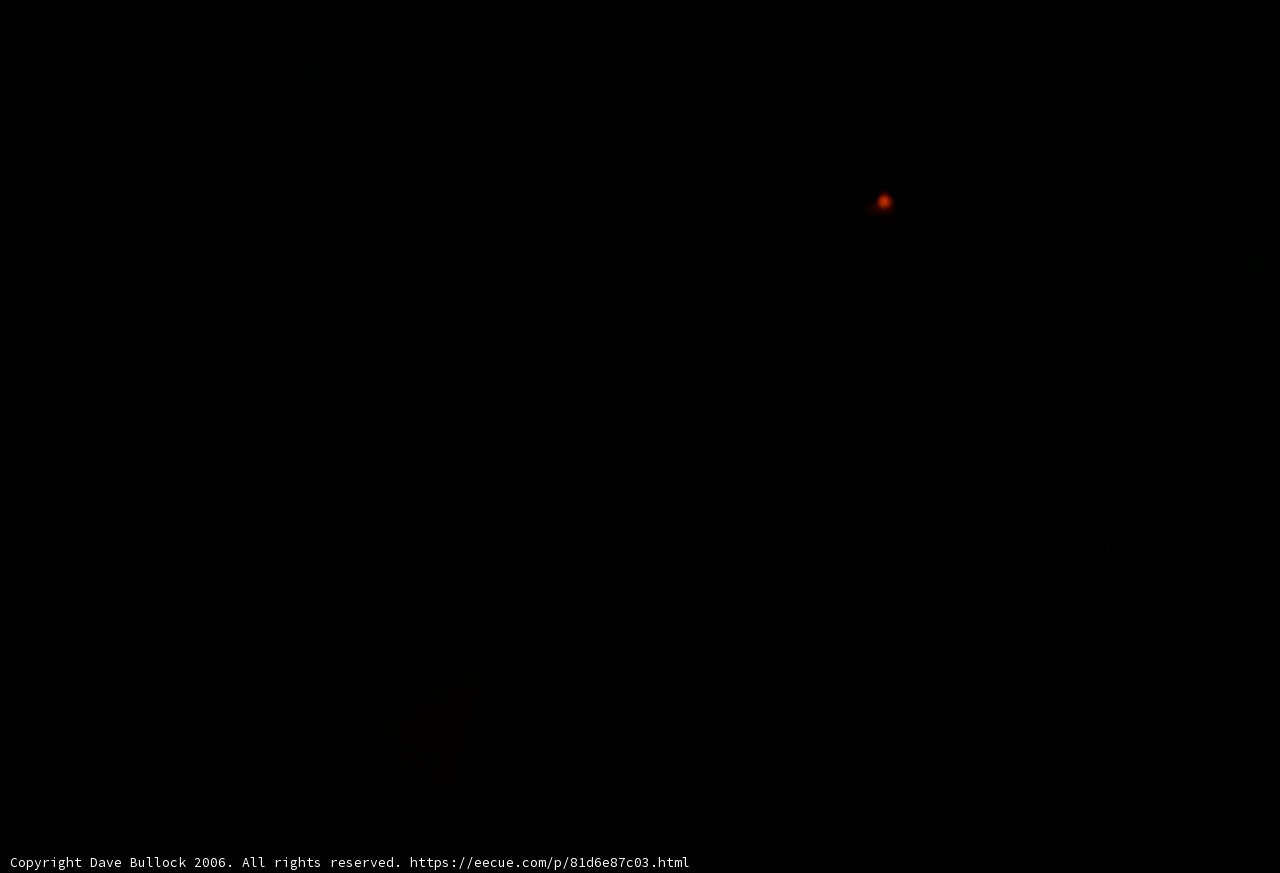 Red Light in the Dark Night Sky