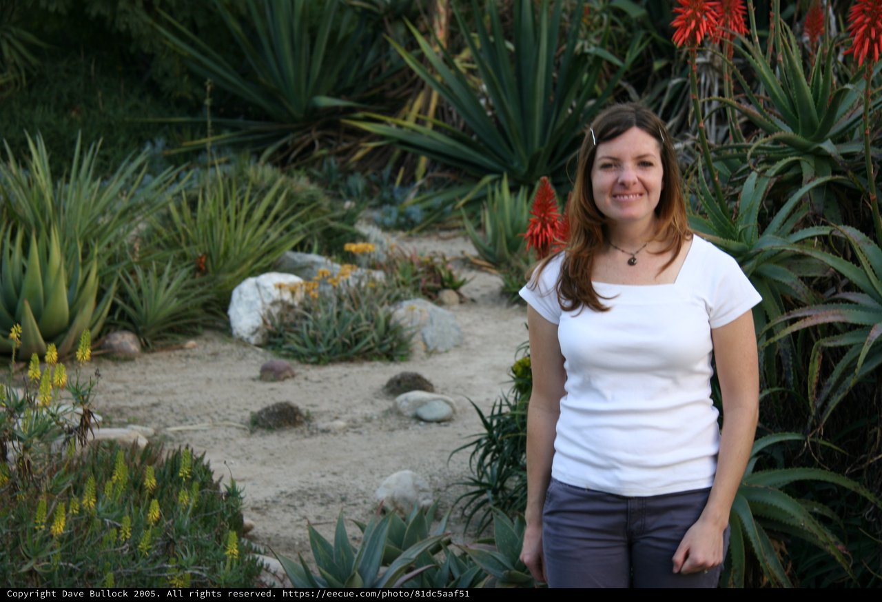 Woman Smiling in Desert Botanical Garden Setting
