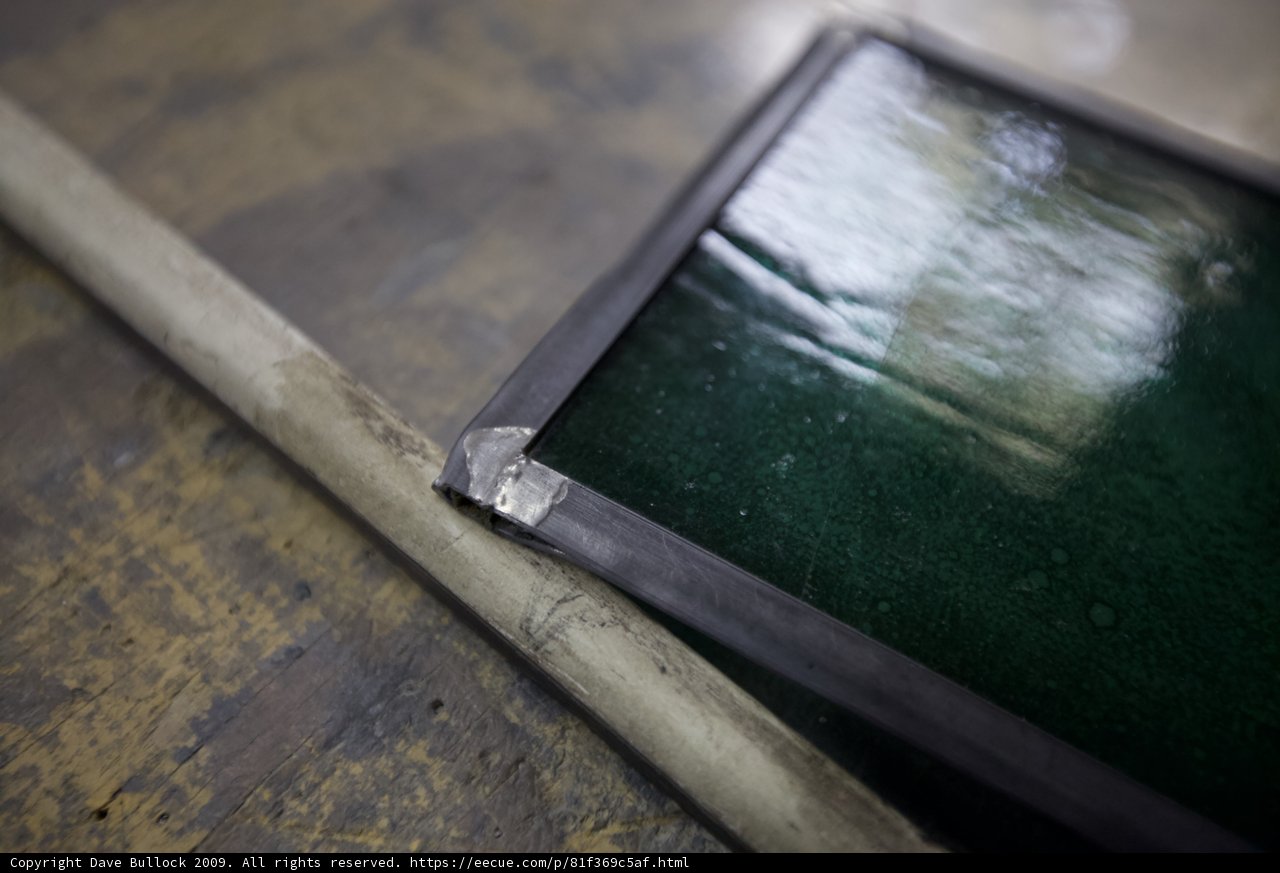 Green Glass and Metal Frame