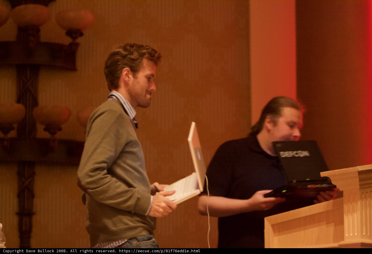 Two Men at the Blackhat Convention