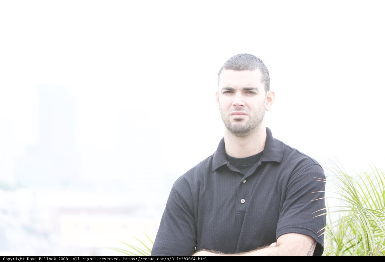 Happy Man in Black Shirt
