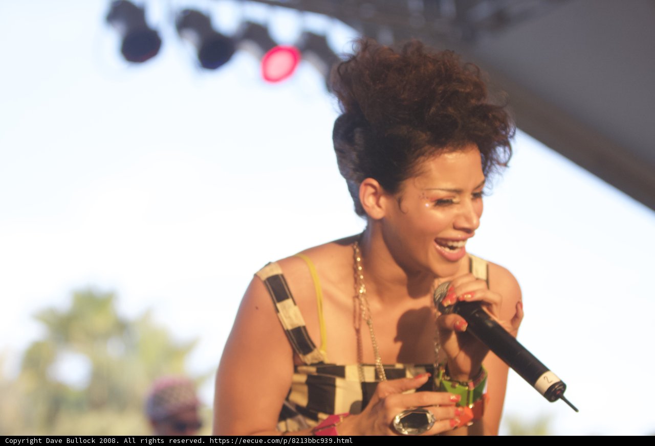 The Curly-Haired Songstress