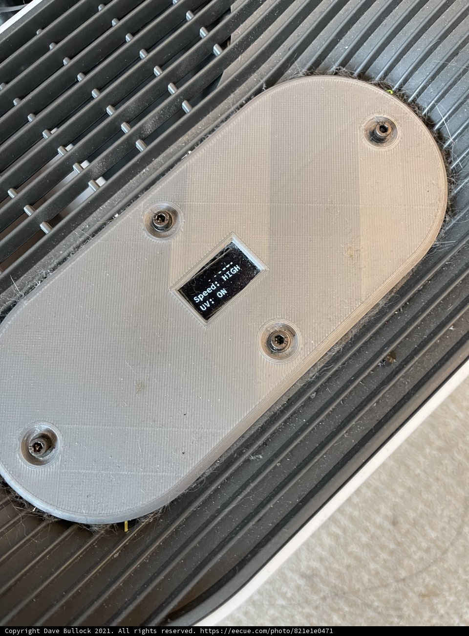 Button on Metal Plate