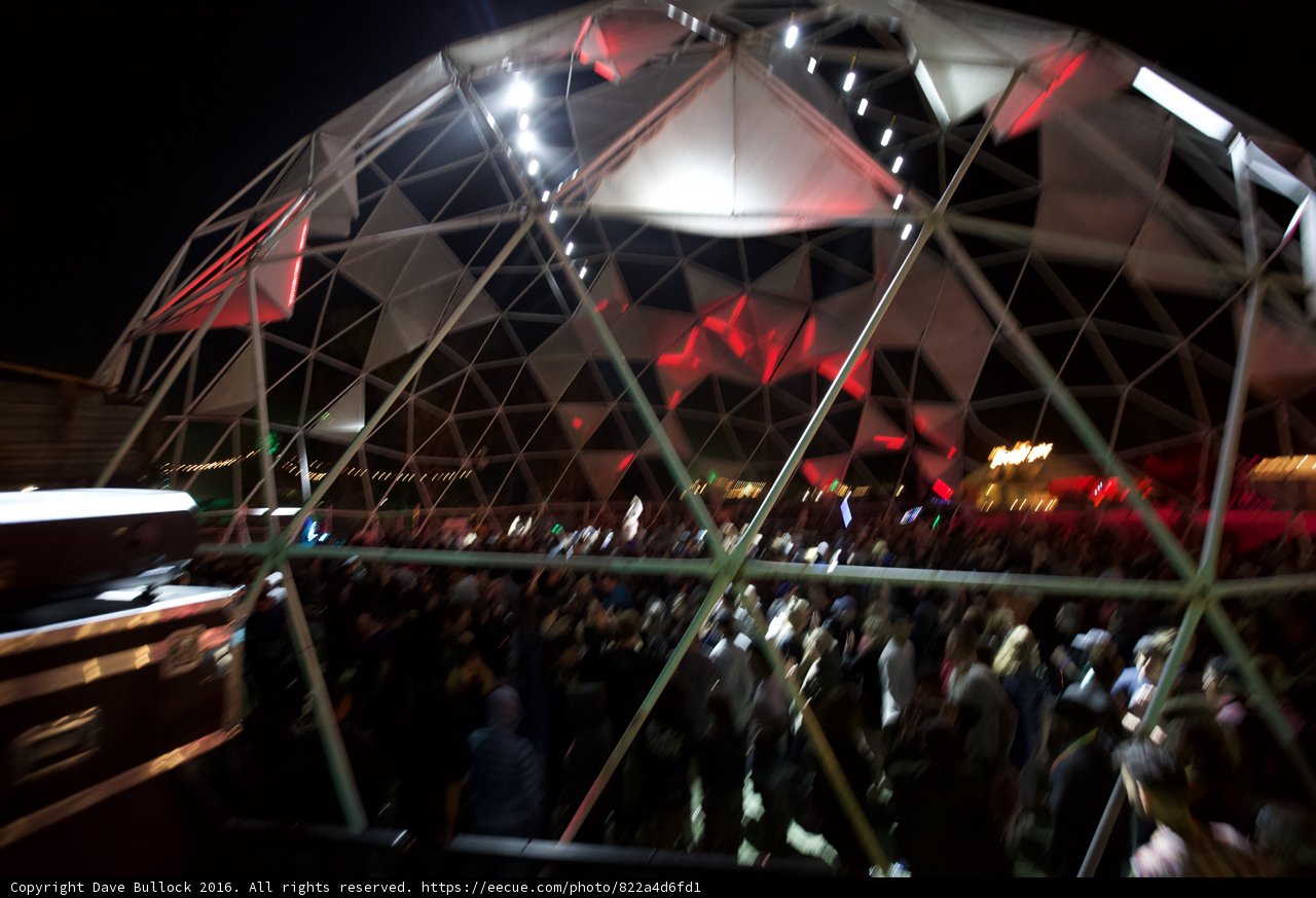 Urban Night Skyline with Large Dome