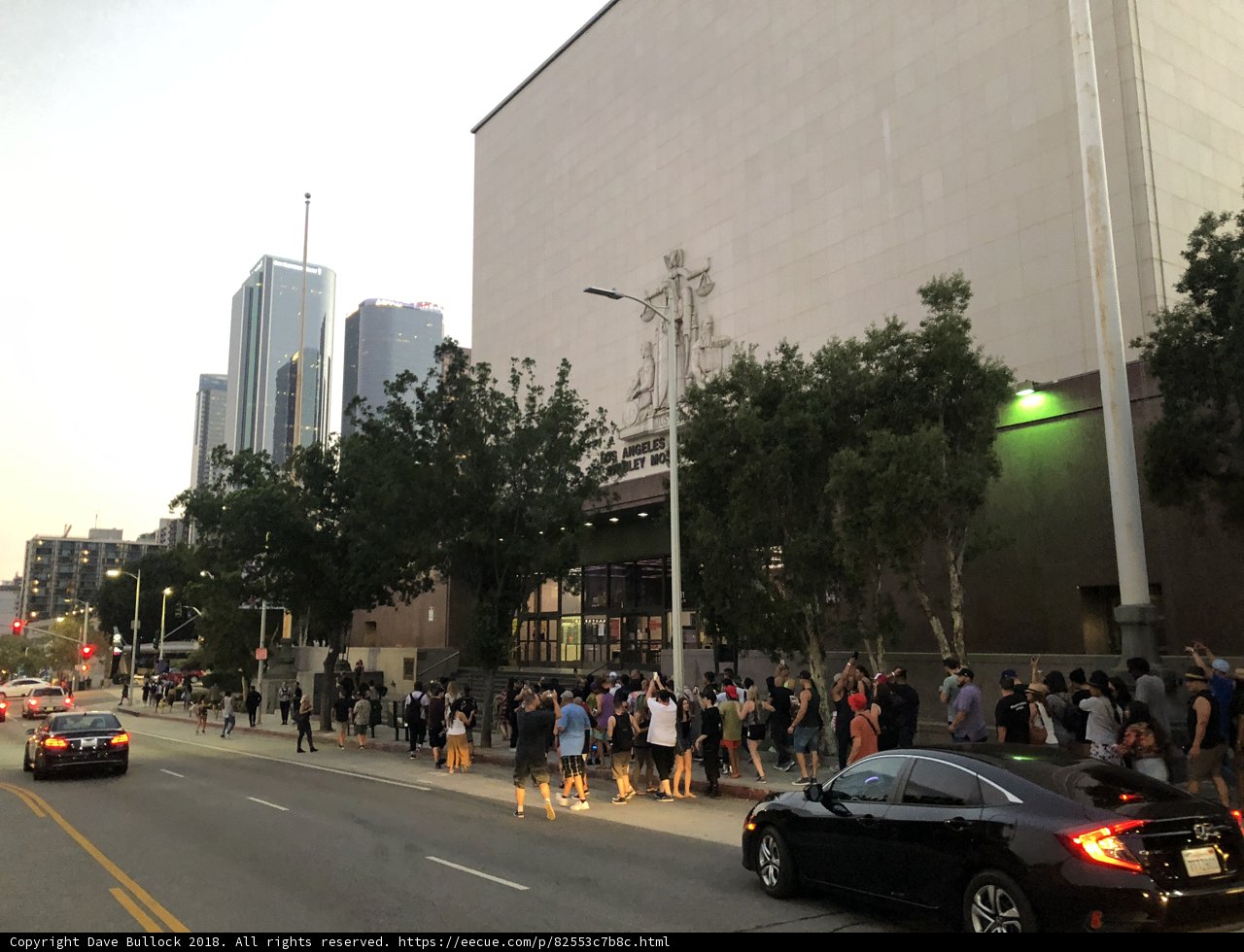 Urban Crowd at Busy Intersection