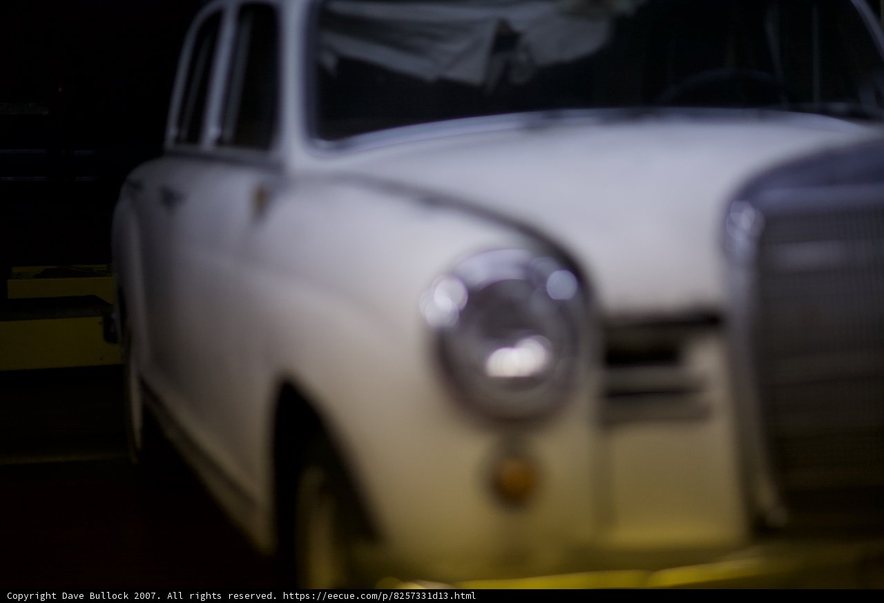 Spoke Machine on a White Sports Car