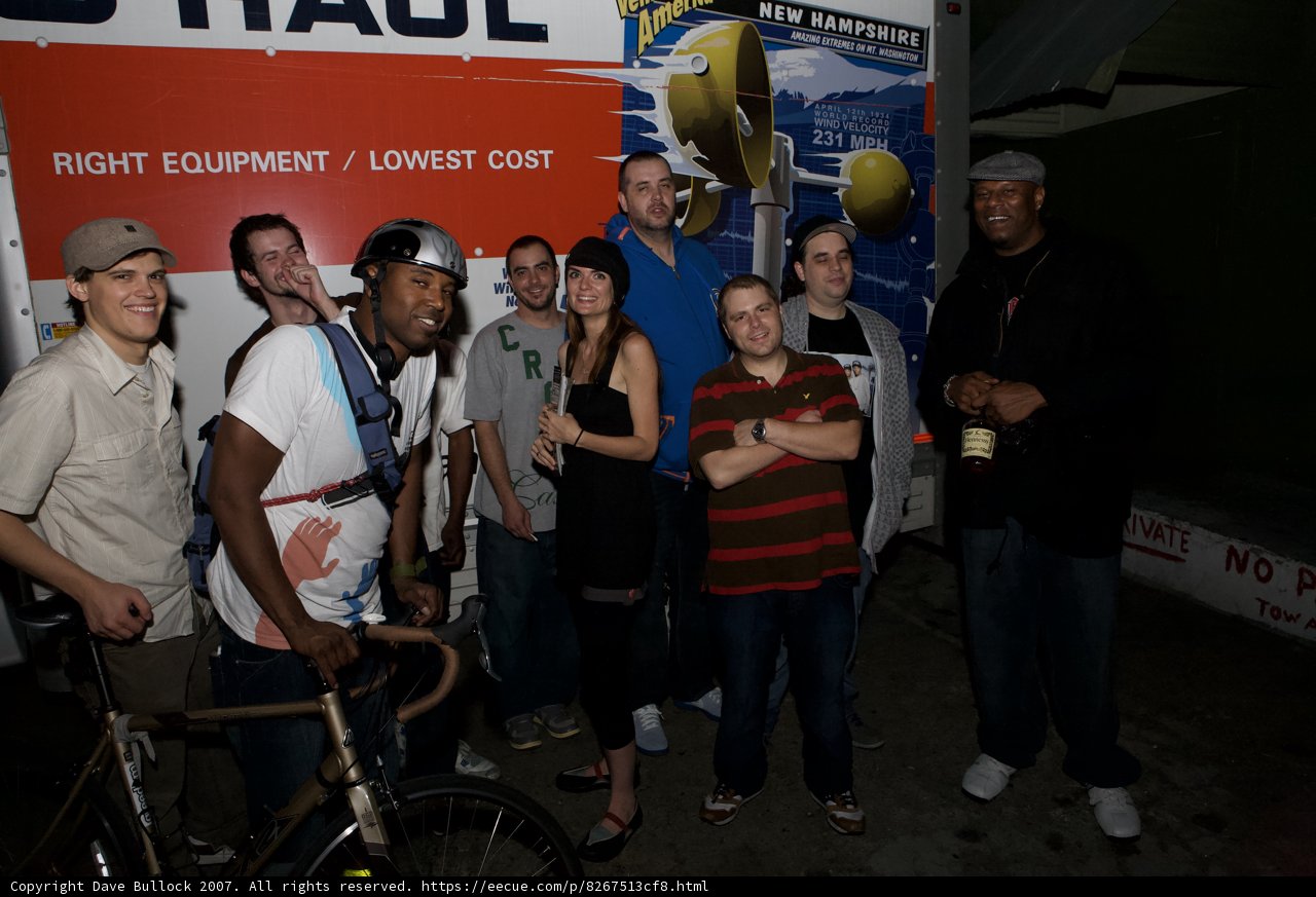 Group of People in Front of Truck