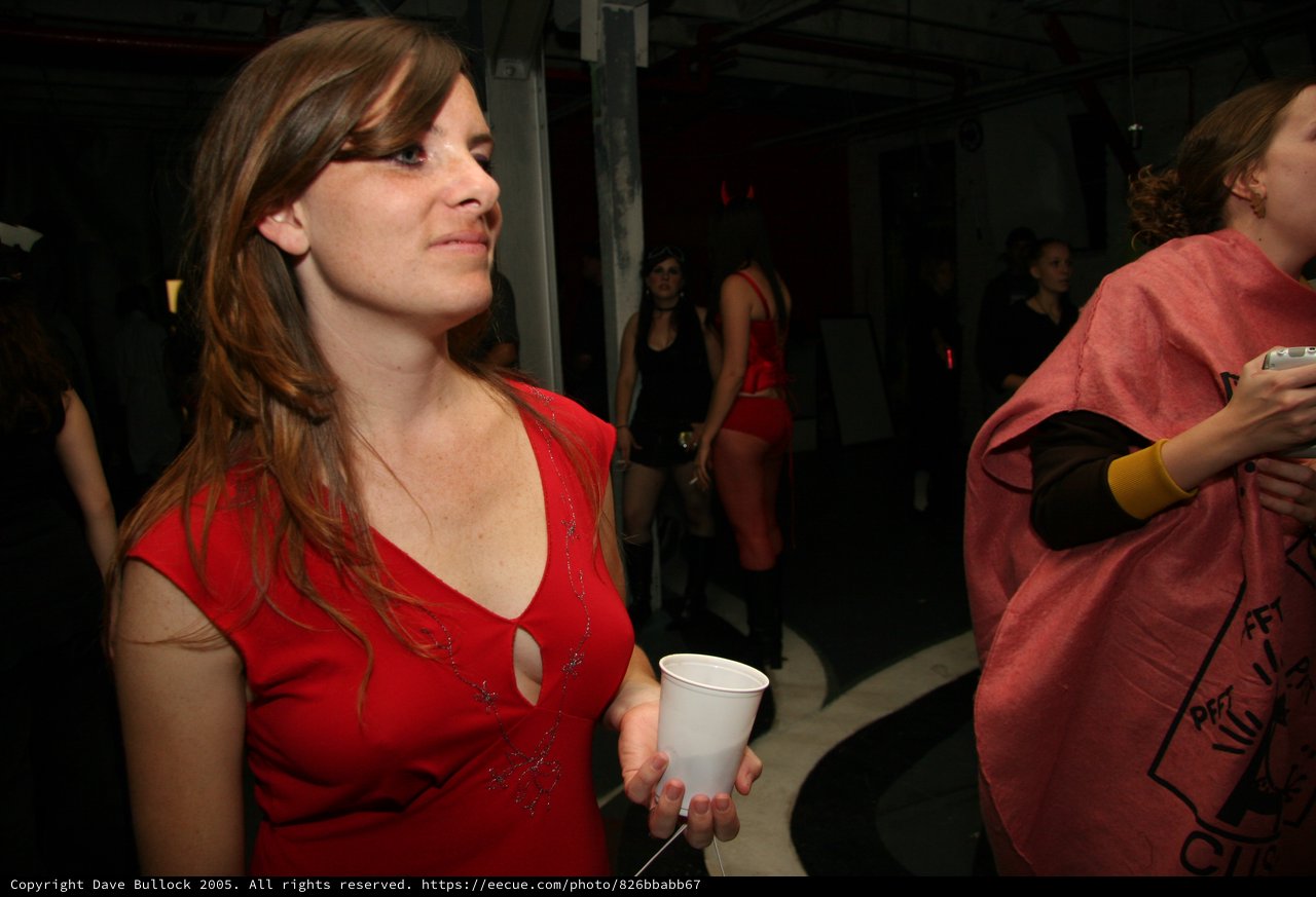 Woman in Red Dress at Nightclub Party 2005