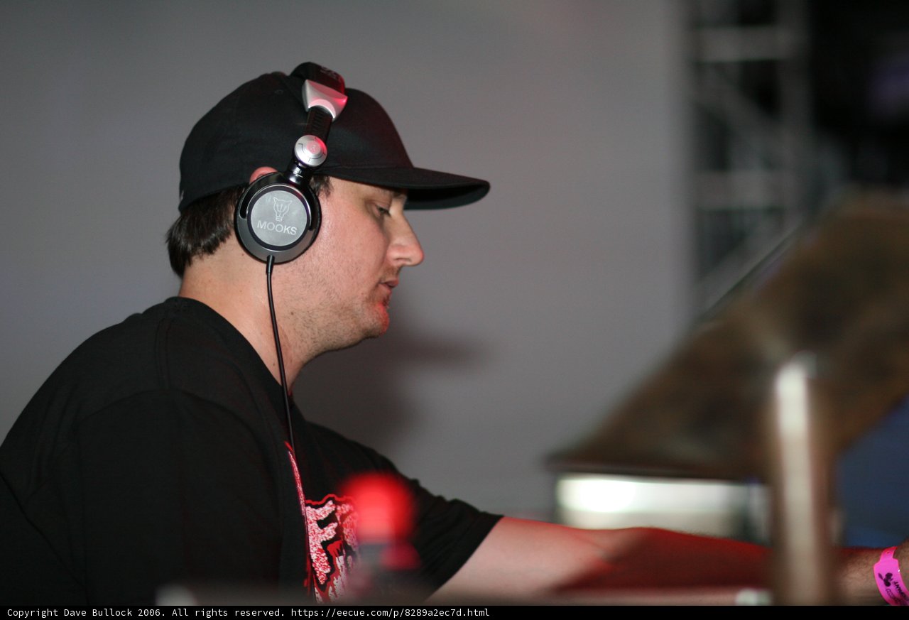 The Man with the Baseball Cap and Headphones