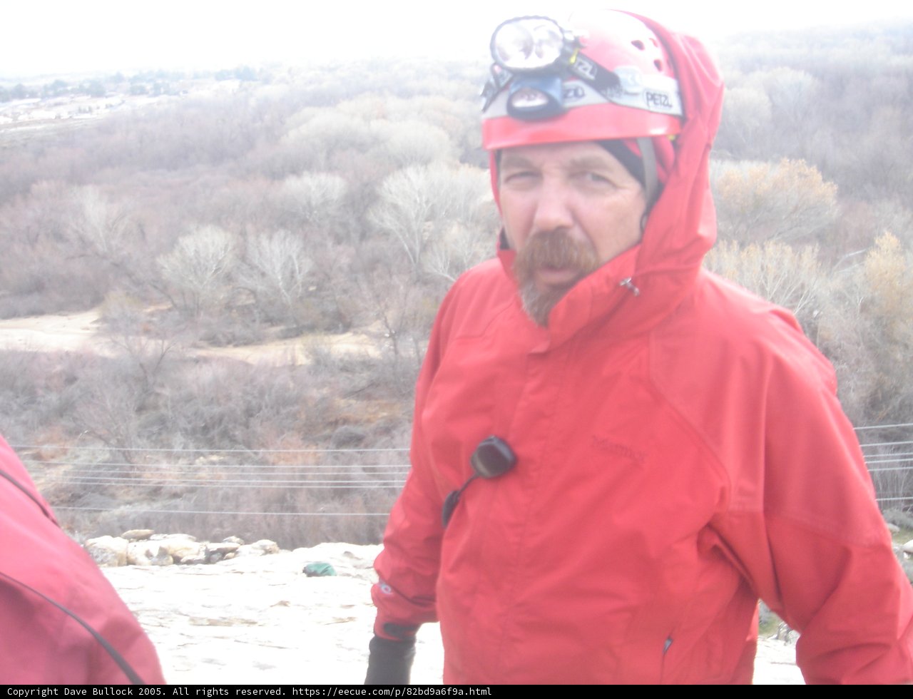 Red Jacket and Helmet in Snowy Landscape