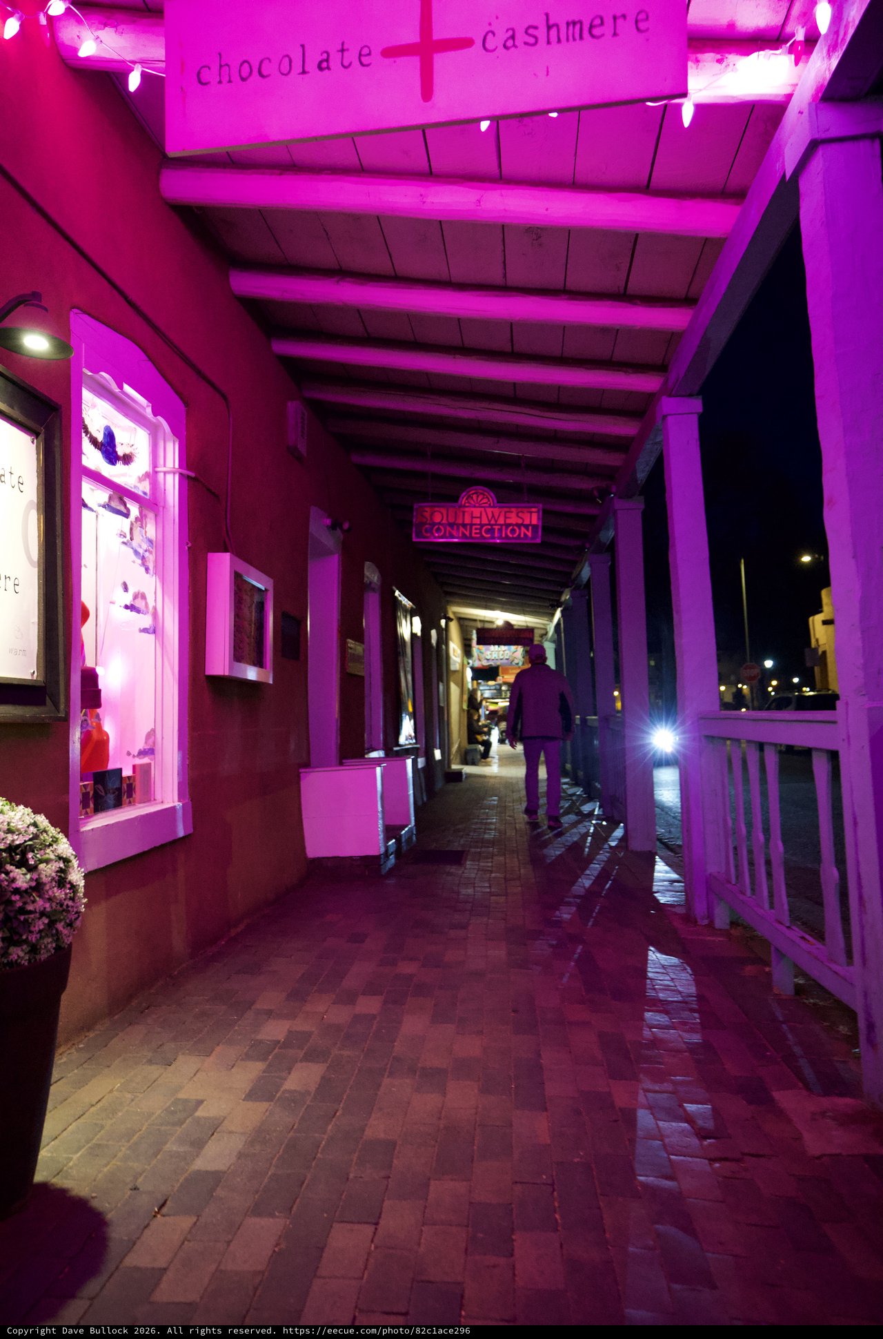 Purple-Lit Shopping Arcade at Night in Santa Fe