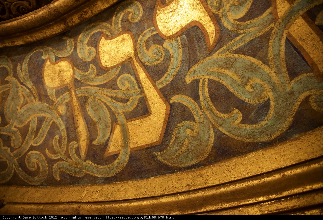 Golden Arabic Writing on a Historical Building