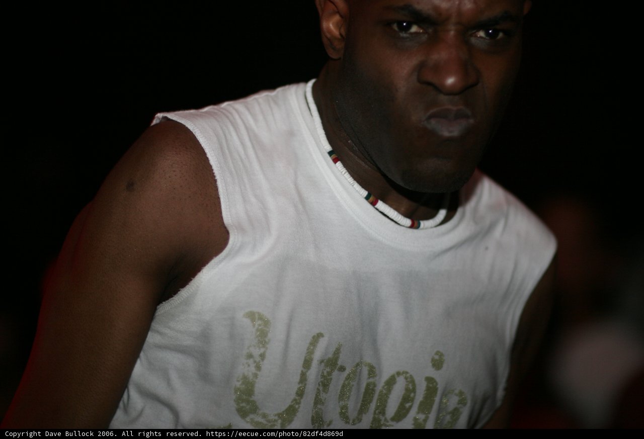 MC Q in a Crisp White T-Shirt