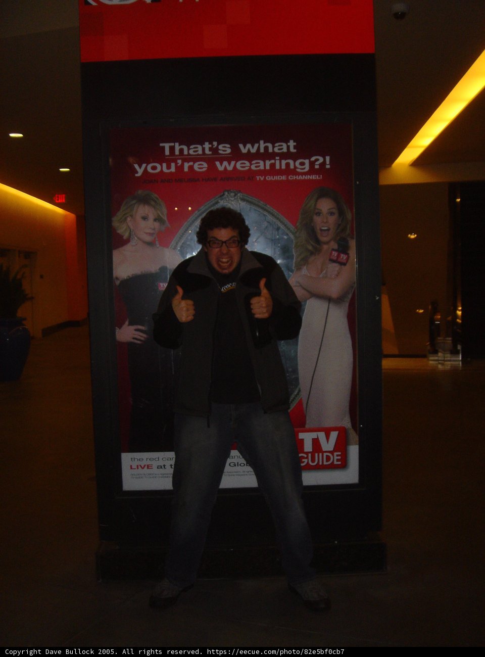 Thumbs up for an Advertisement in Front of the TV