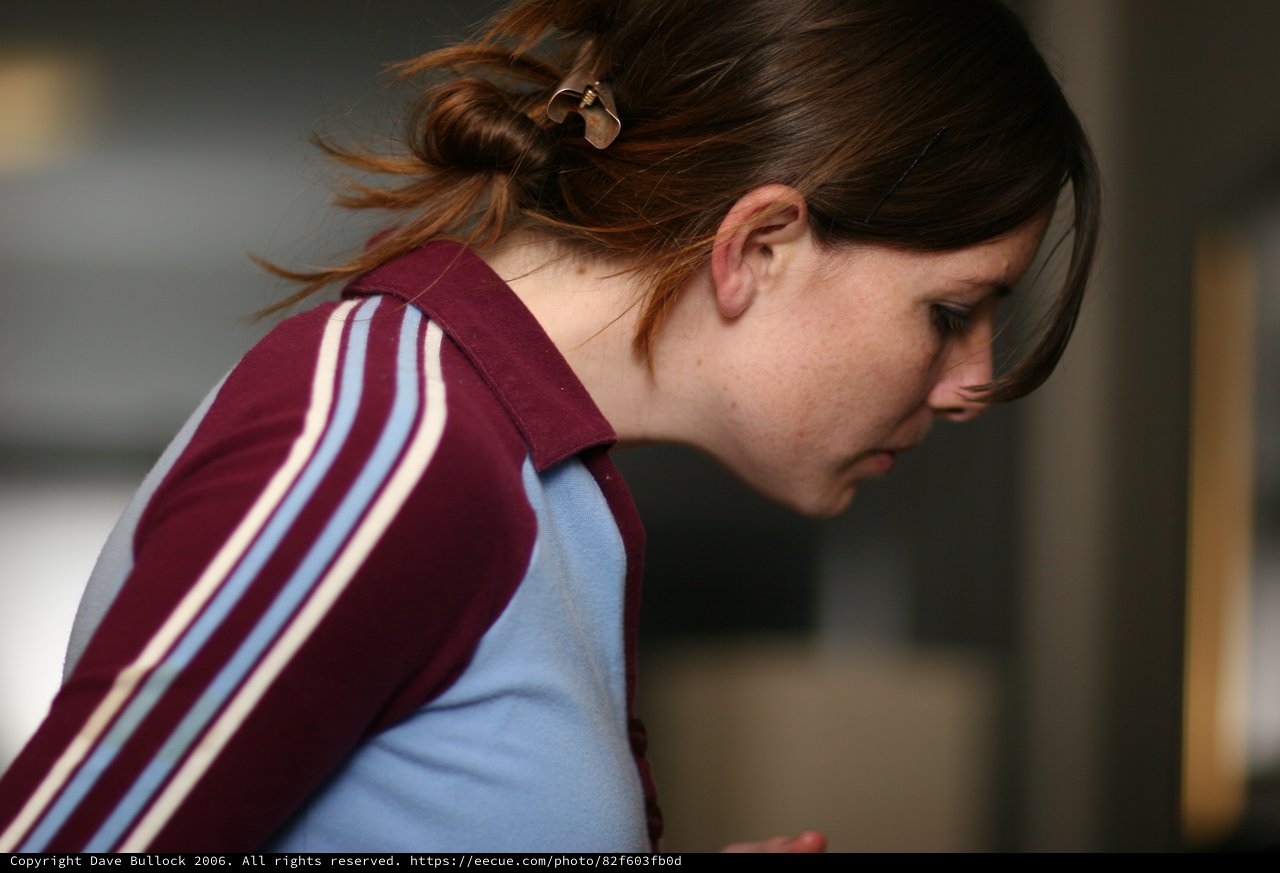 Young Woman Lost in Thought, Profile Close-Up