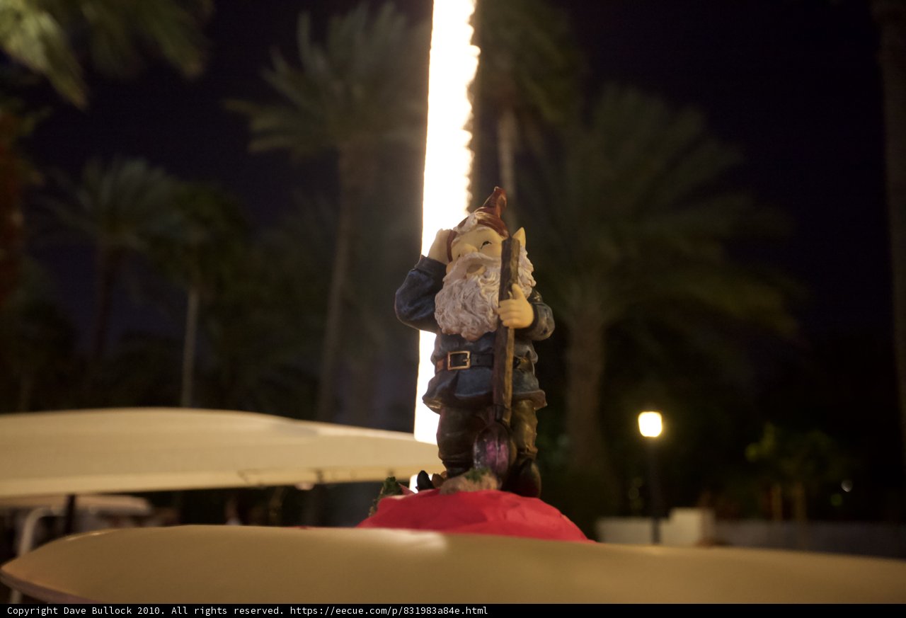 Statue of Man with Torch on Car
