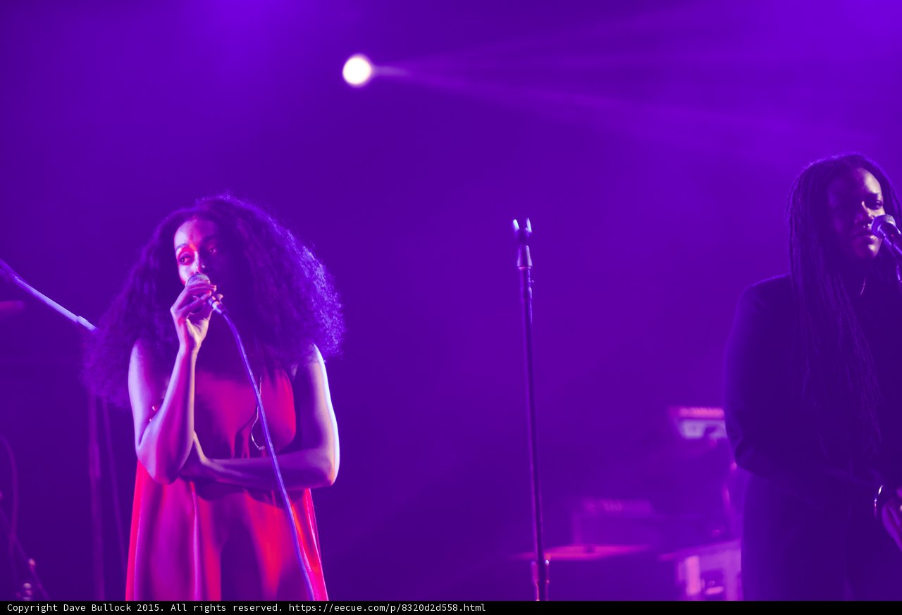 Solange Three Quarter View Red Dress Wild Hair Backing Vocalist Purple Haze