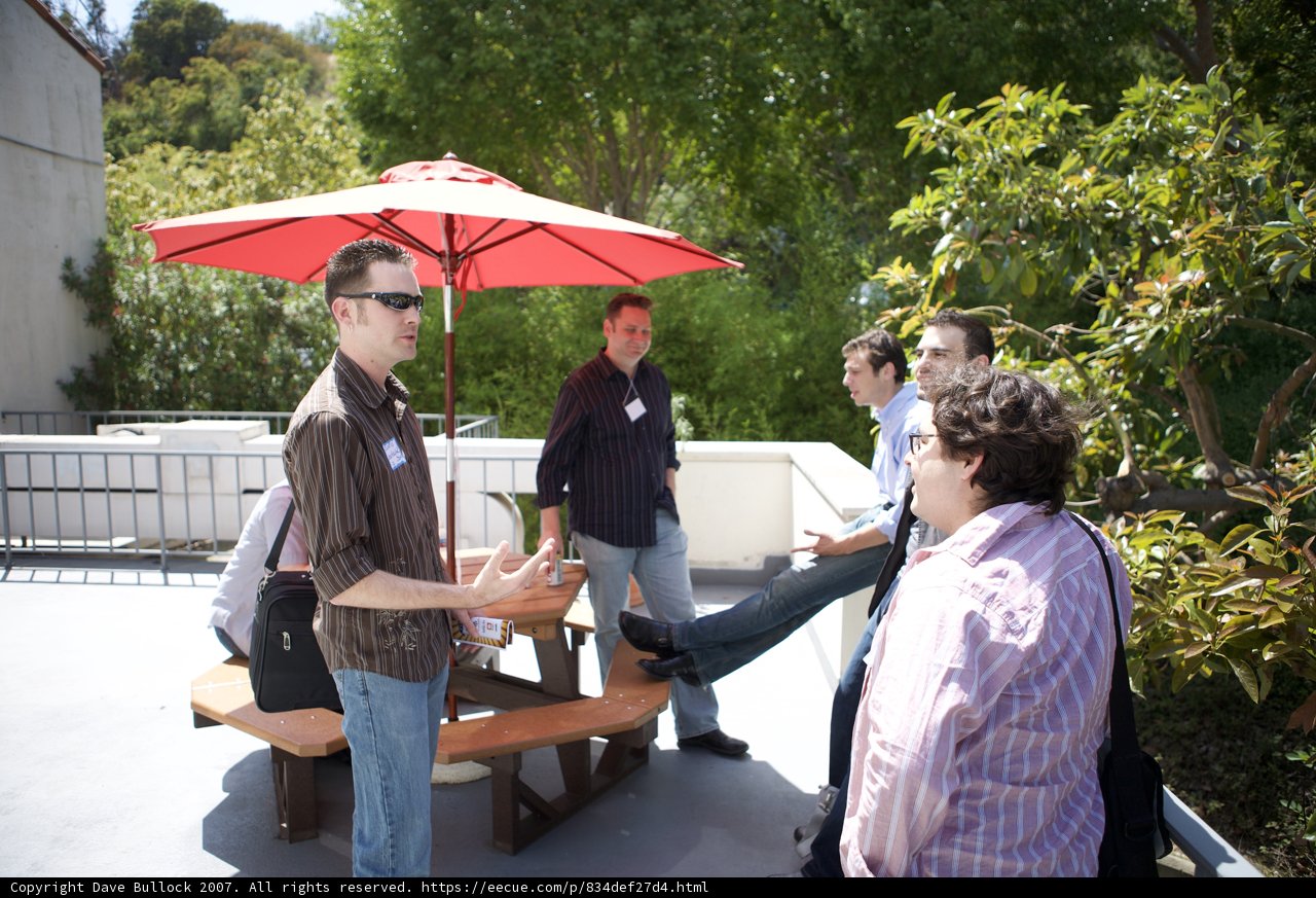Gathering Around the Plywood Table