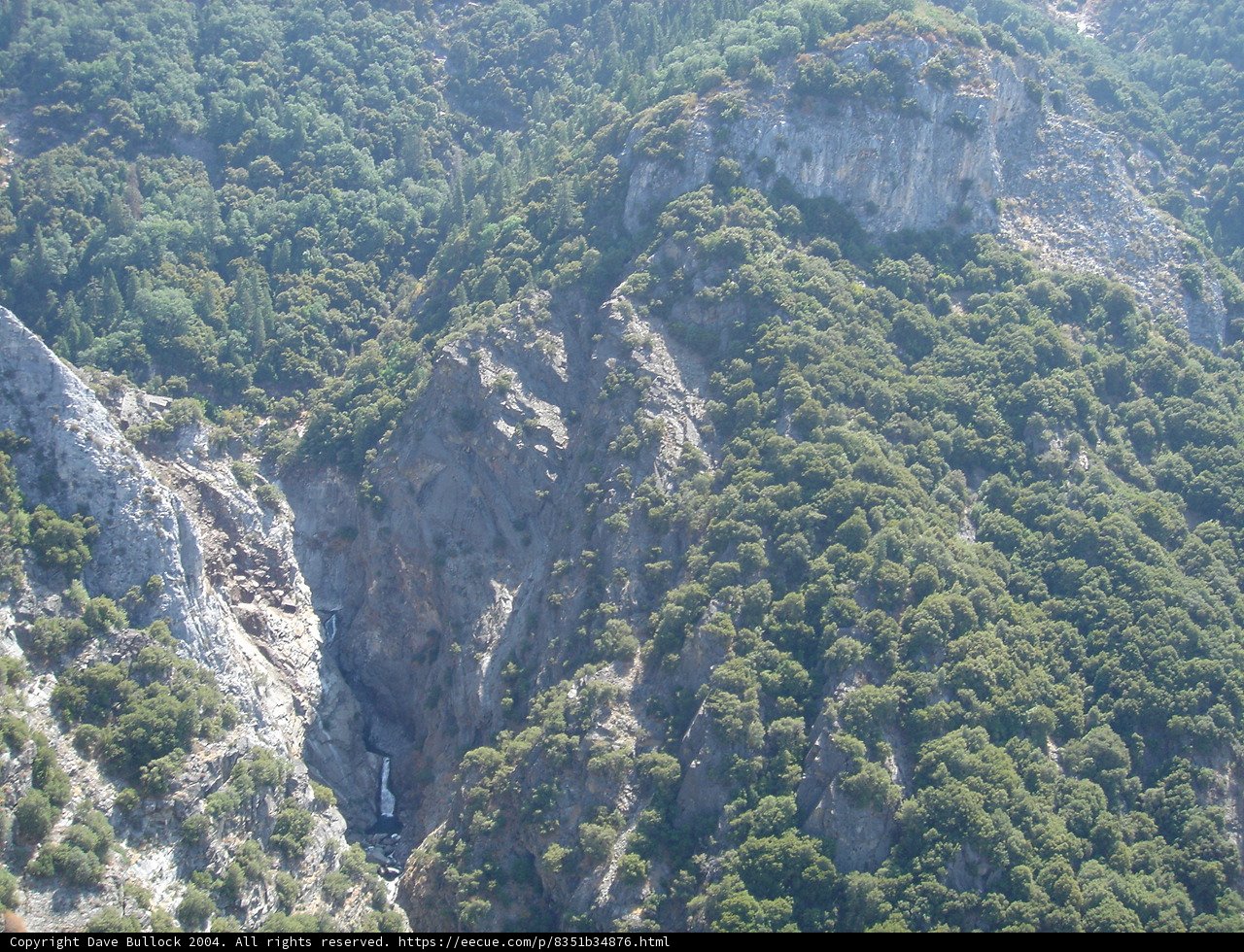 Majestic Mountain Range with Cascading Waterfall