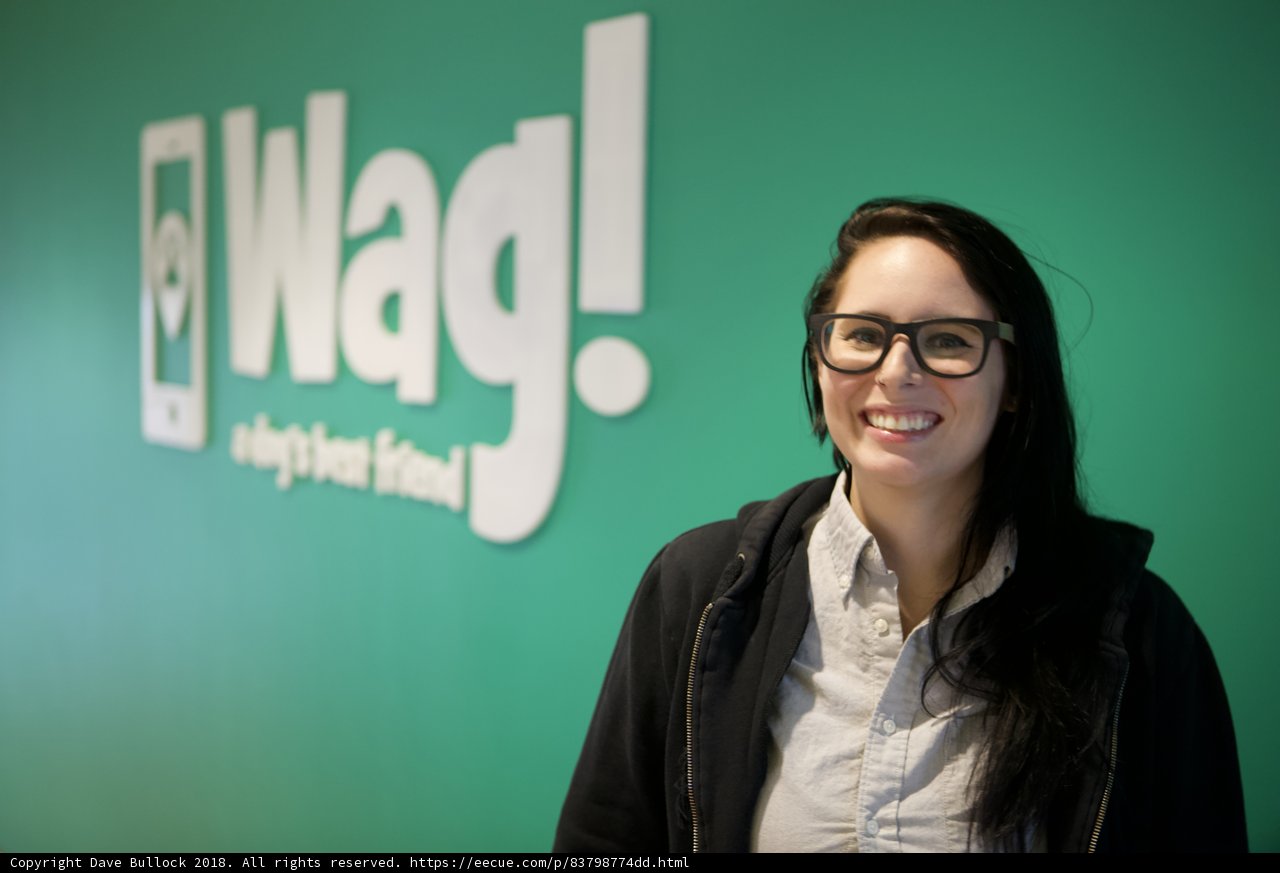 Smiling Woman in Glasses and Jacket