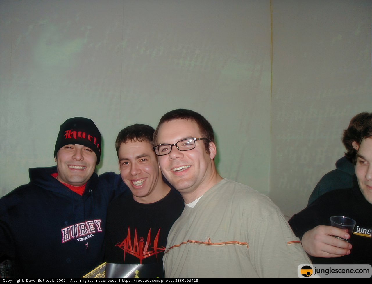 Three Men Smiling for the Camera