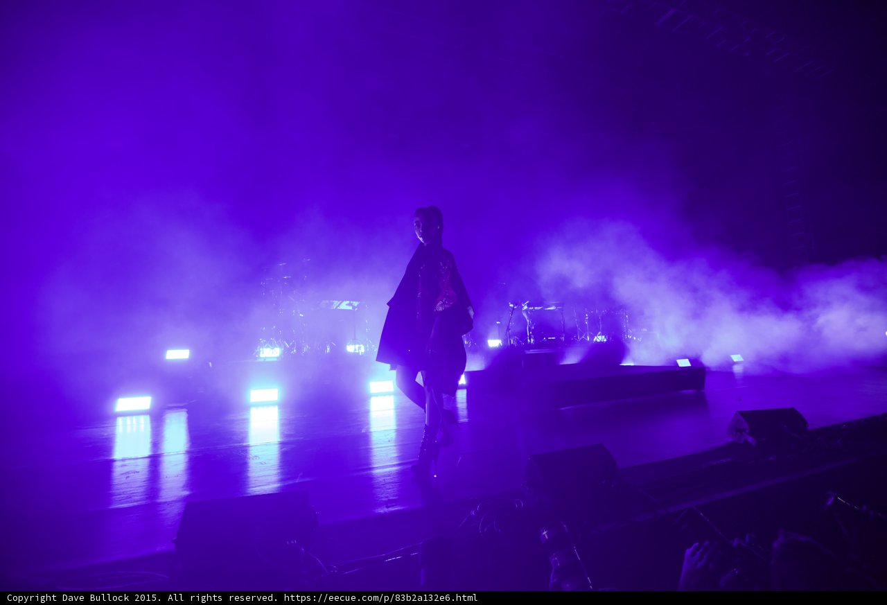 FKA twigs Wide Stage Purple Lighting Red Brocade Kimono LED Lights Band Drums Polished Floor Haze