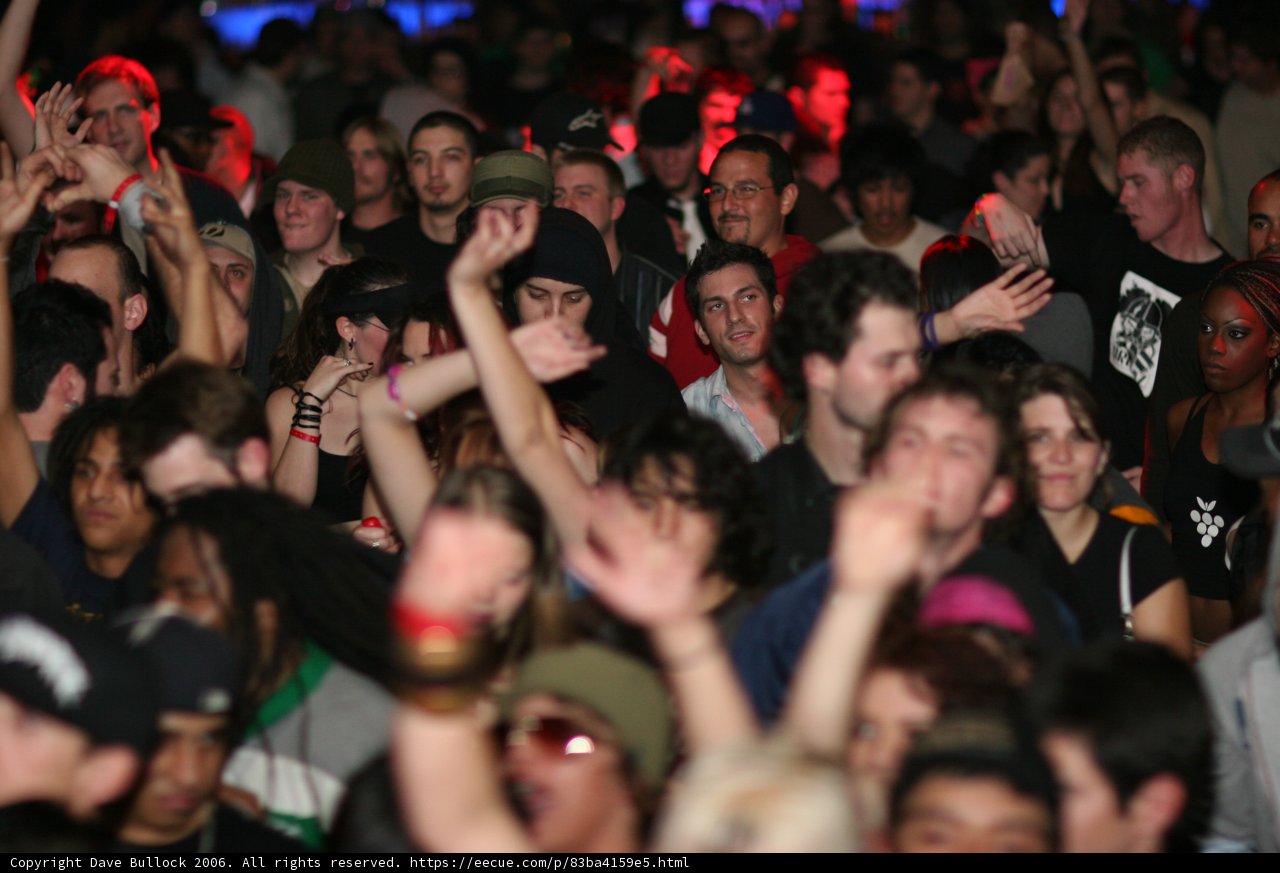 Urban Concert Crowd with Hands Up