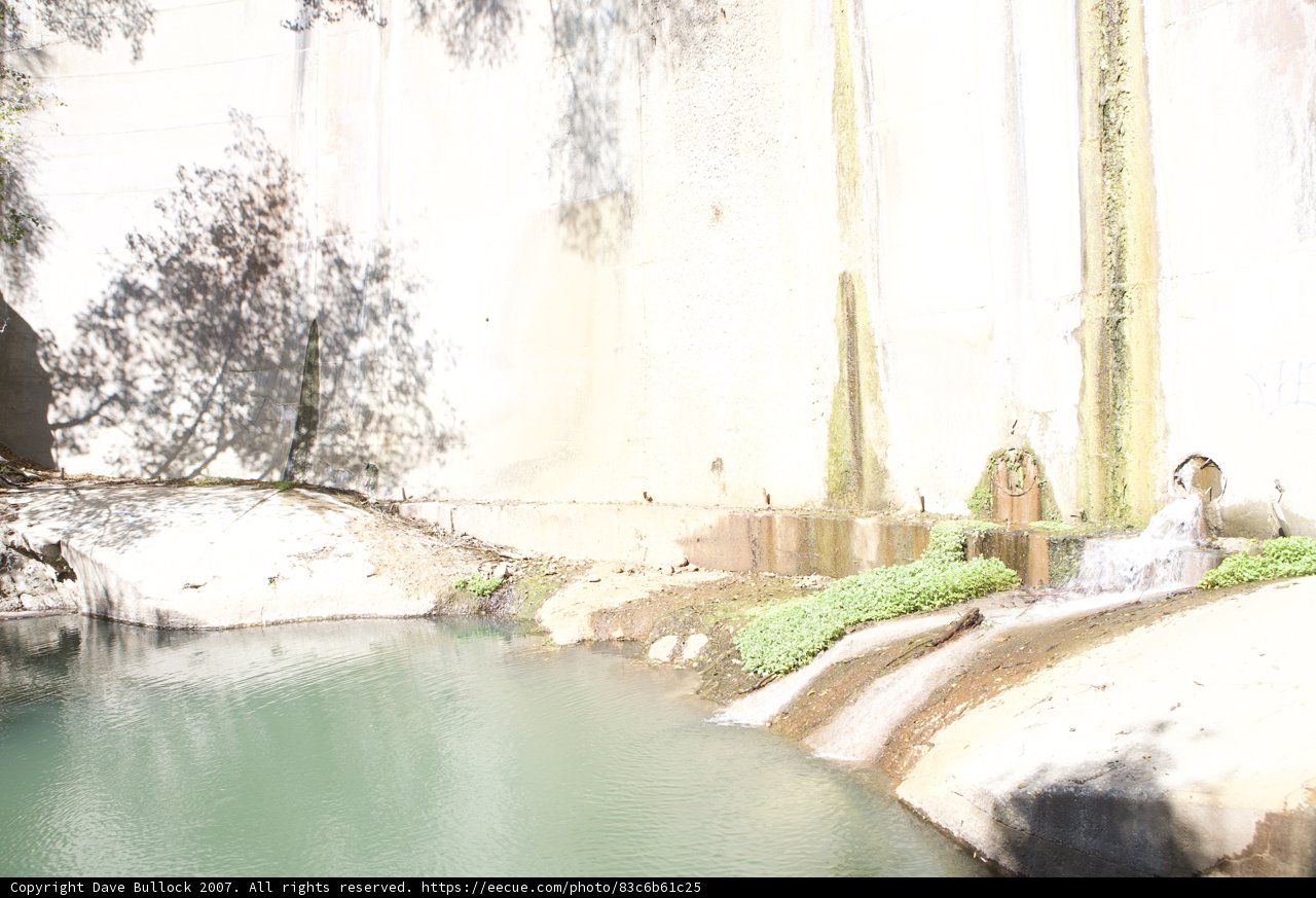 Tranquil Waterfall in Nature's Fortress