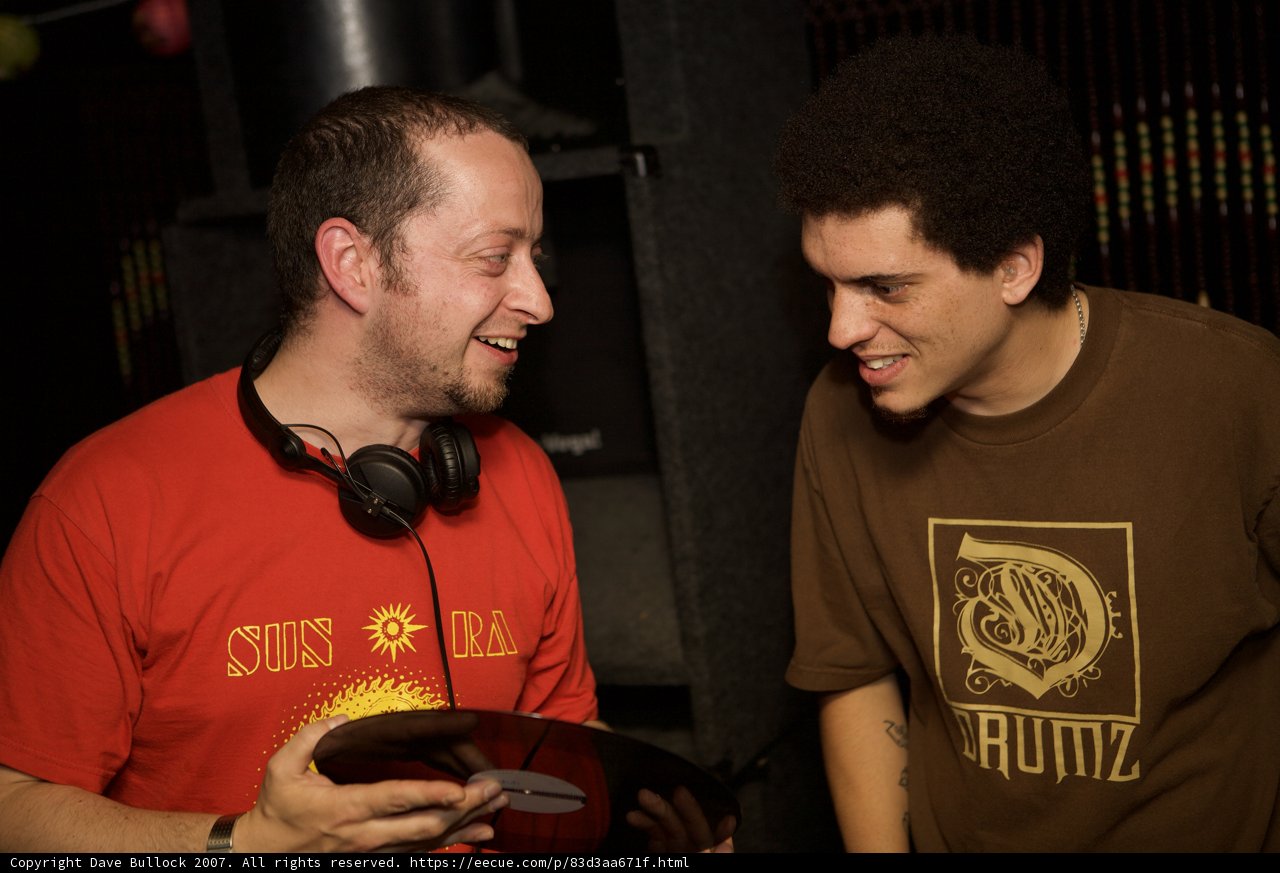 Two Men Celebrating a Record