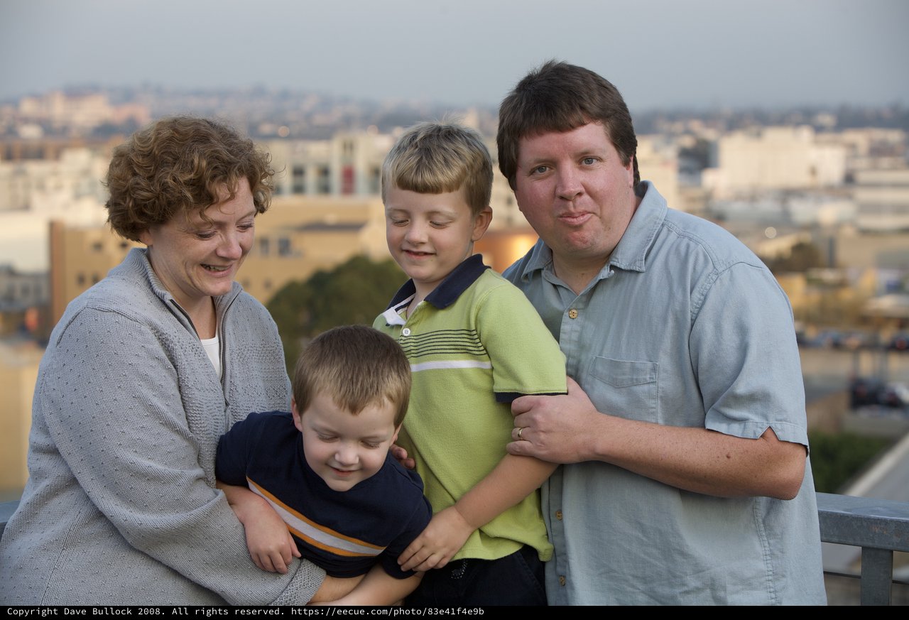 Family Portrait on Rooftop at Dusk