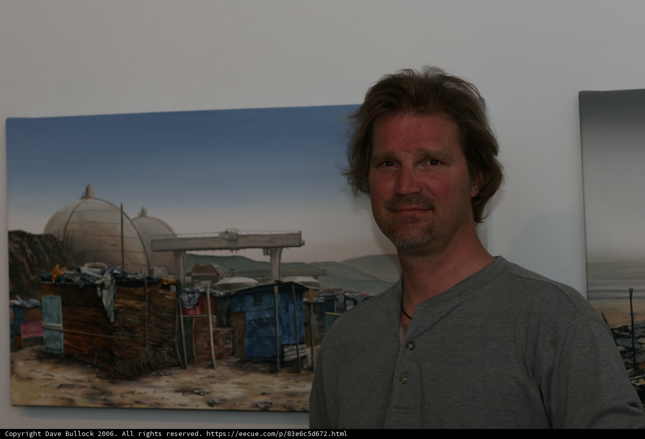Man Contemplates Art in Front of Observatory Painting