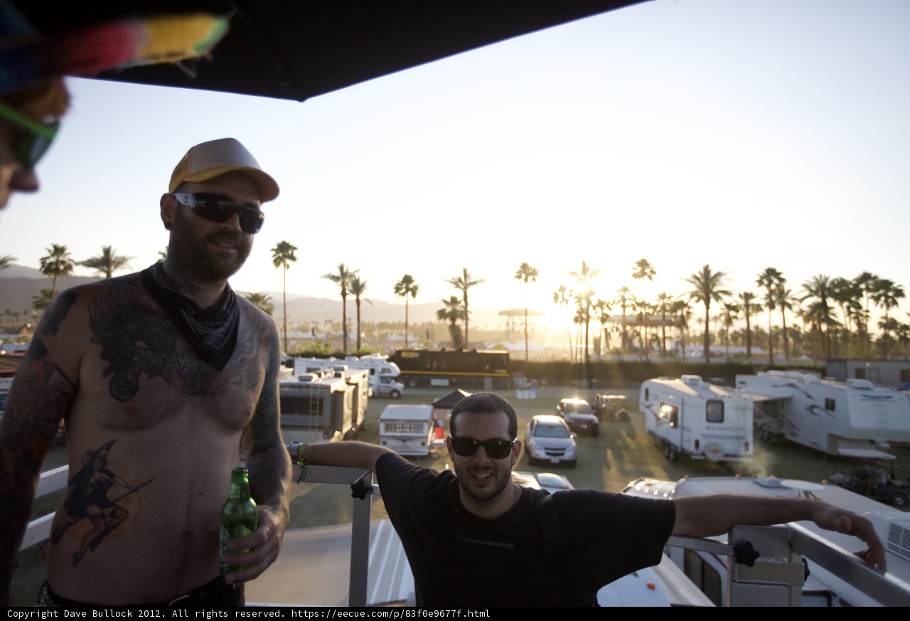 Tattooed Men Enjoying a Beer on the Patio