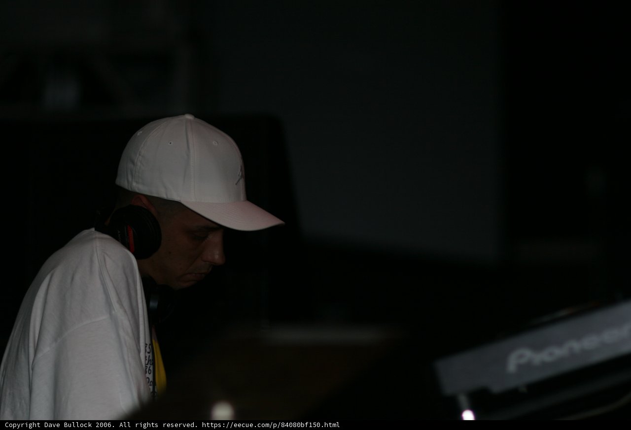 DJ S in His White Baseball Cap and Headphones