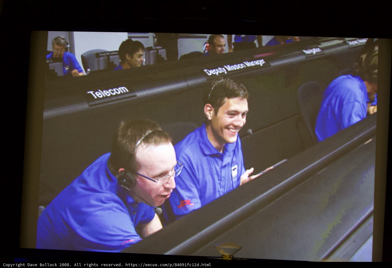 Blue-Shirted Duo at Desk