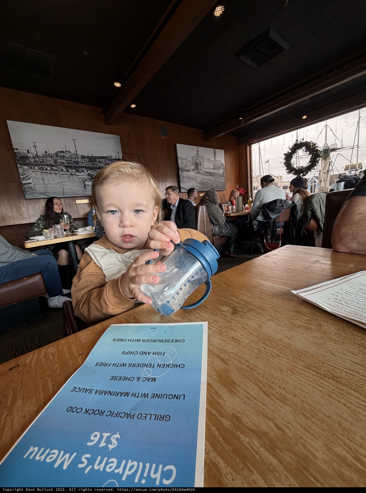 Toddler with Sippy Cup at Waterfront Restaurant