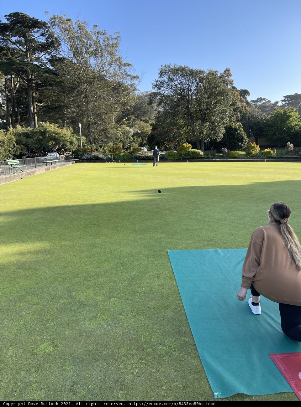 Playing Lawn Bowls on a Sunny Day