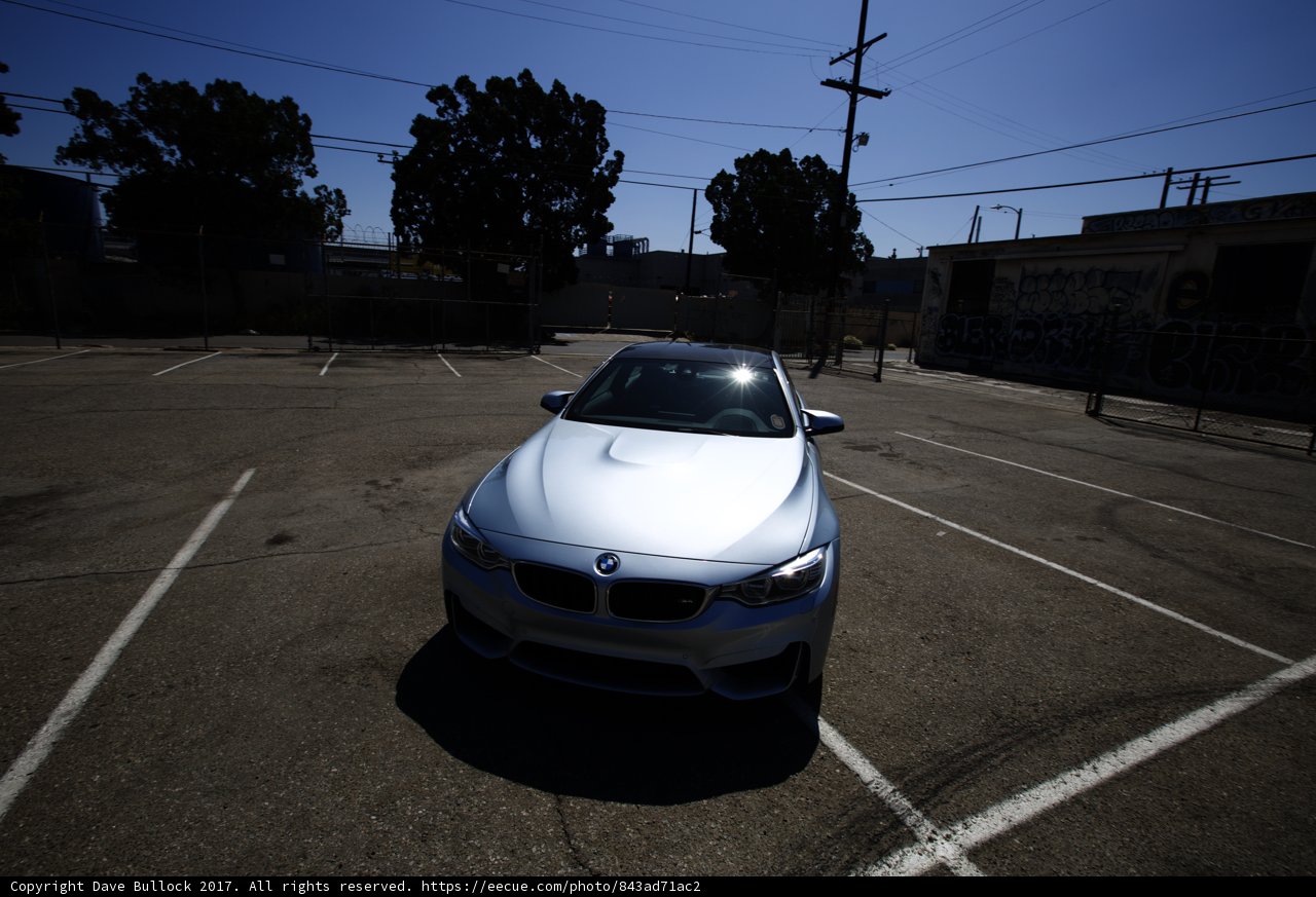 BMW M5 Coupe parked in a City Parking Lot
