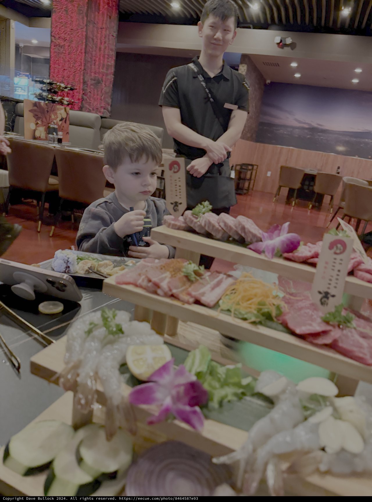 Young Child Enjoying Sushi Restaurant Experience