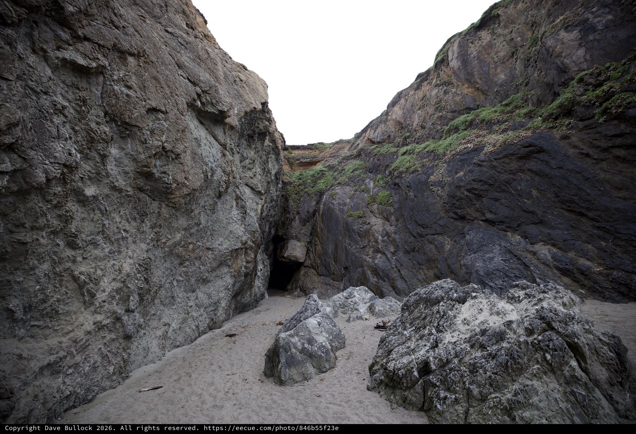 Hidden Sea Cave Nestled Between Dramatic Coastal Cliffs