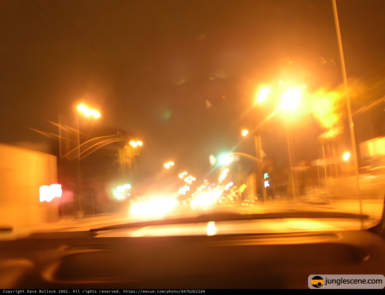 Blurred Urban Night Drive Through City Streets
