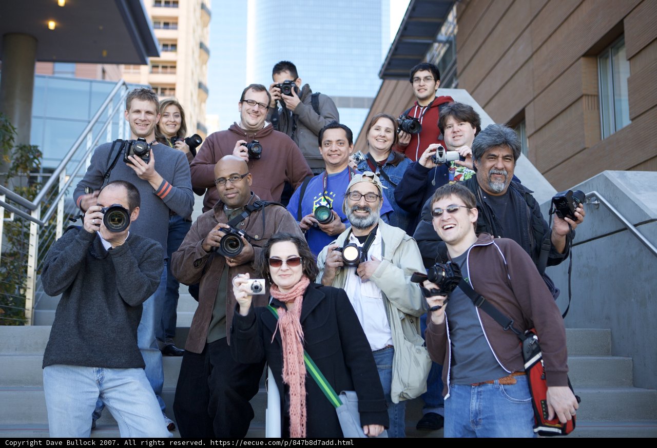 Photographer Paparazzi and a Fashionable Crowd
