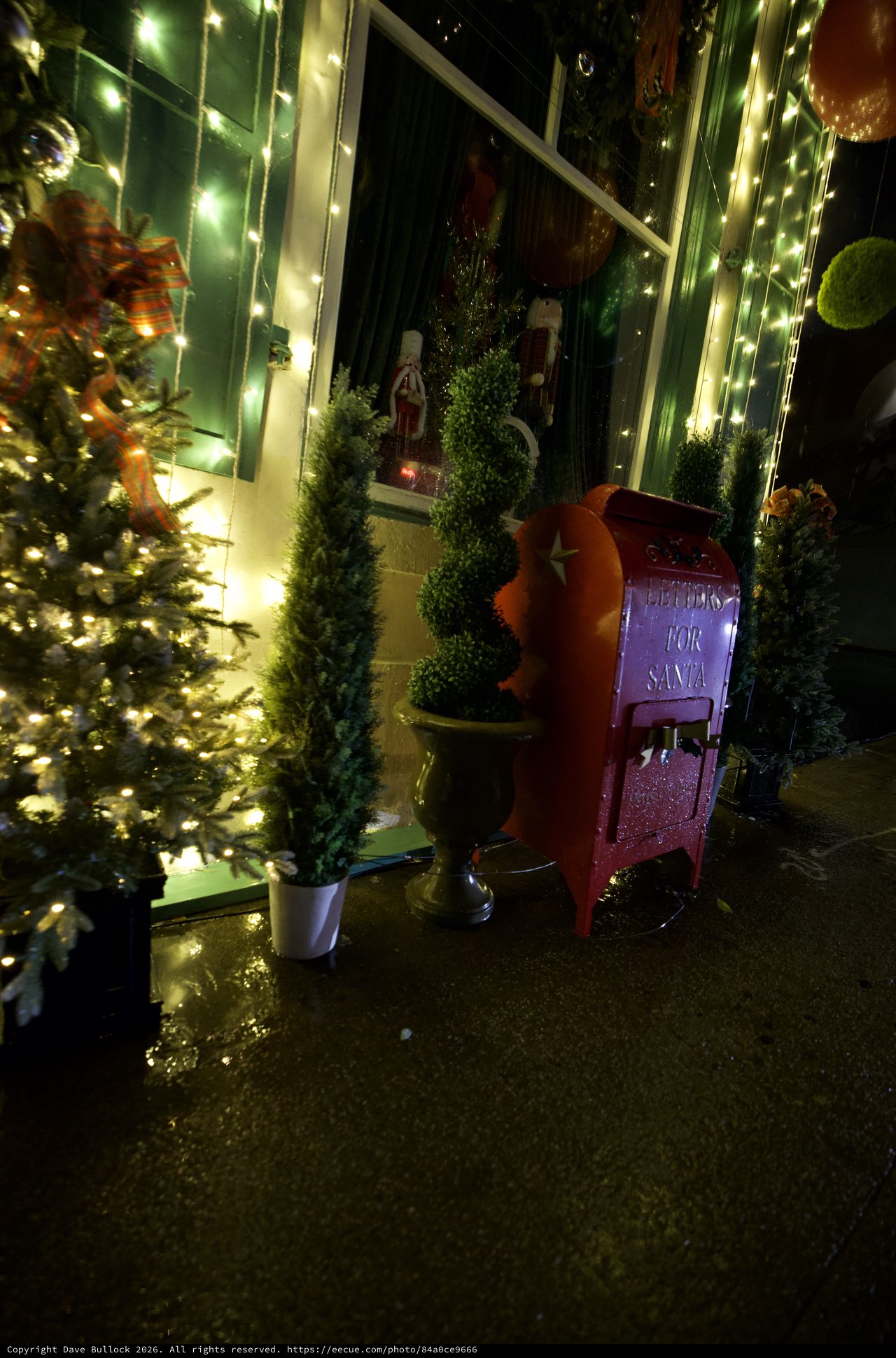Festive Christmas Display with Santa Mailbox and Twinkling Lights