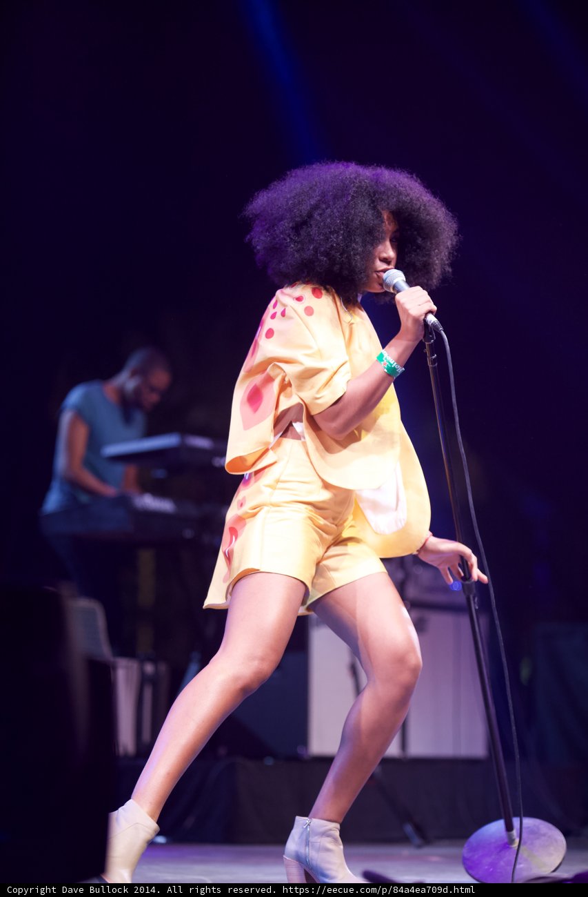 Solange Takes the Stage in Electric Yellow Outfit