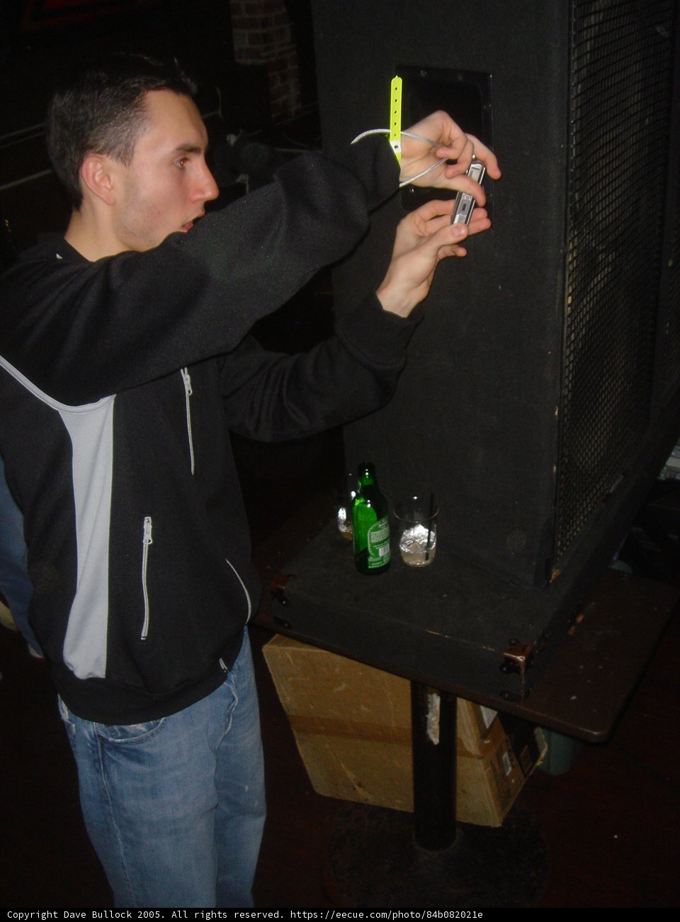 Man Enjoying a Drink and a Game